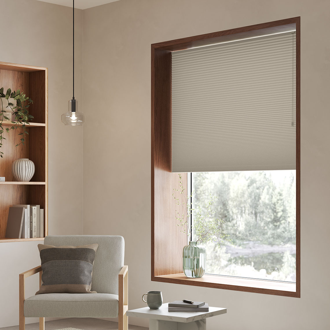 Pleated blackout blind in honeycomb construction in window in living room 